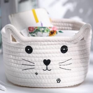 "White cotton rope storage basket with a cute cat face design, ideal for kids’ toy storage and nursery organization."