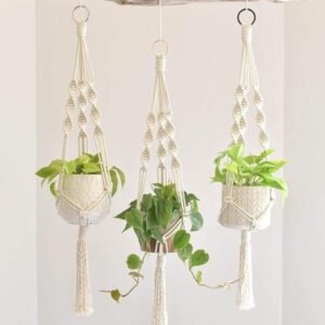 Cotton rope macramé plant hanger for indoor and outdoor use.” “Boho-chic macramé planter hanging in a bright and modern living space