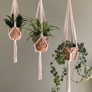 macramé planter hanger, boho plant holder, hanging plant hanger, handmade macramé plant hanger, indoor plant decor, boho home accessories, cotton macramé plant hanger, macramé hanging planter, eco-friendly plant hanger, boho hanging decor